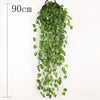 A long, cascading artificial plant vine wall hanging with green leaves.