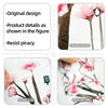 Wall stickers featuring pink cherry blossom branches and flowers on a white background, shown from the front and reverse side