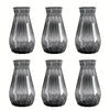 A set of four faceted diamond crystal clear plastic vases for table decor.