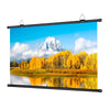 A horizontal projection screen displaying a vibrant landscape with mountains, yellow autumn trees, and a reflective body of w