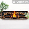 A rustic metal sign featuring the text Backyard Bar & Grill and a flaming pit for patio decor.