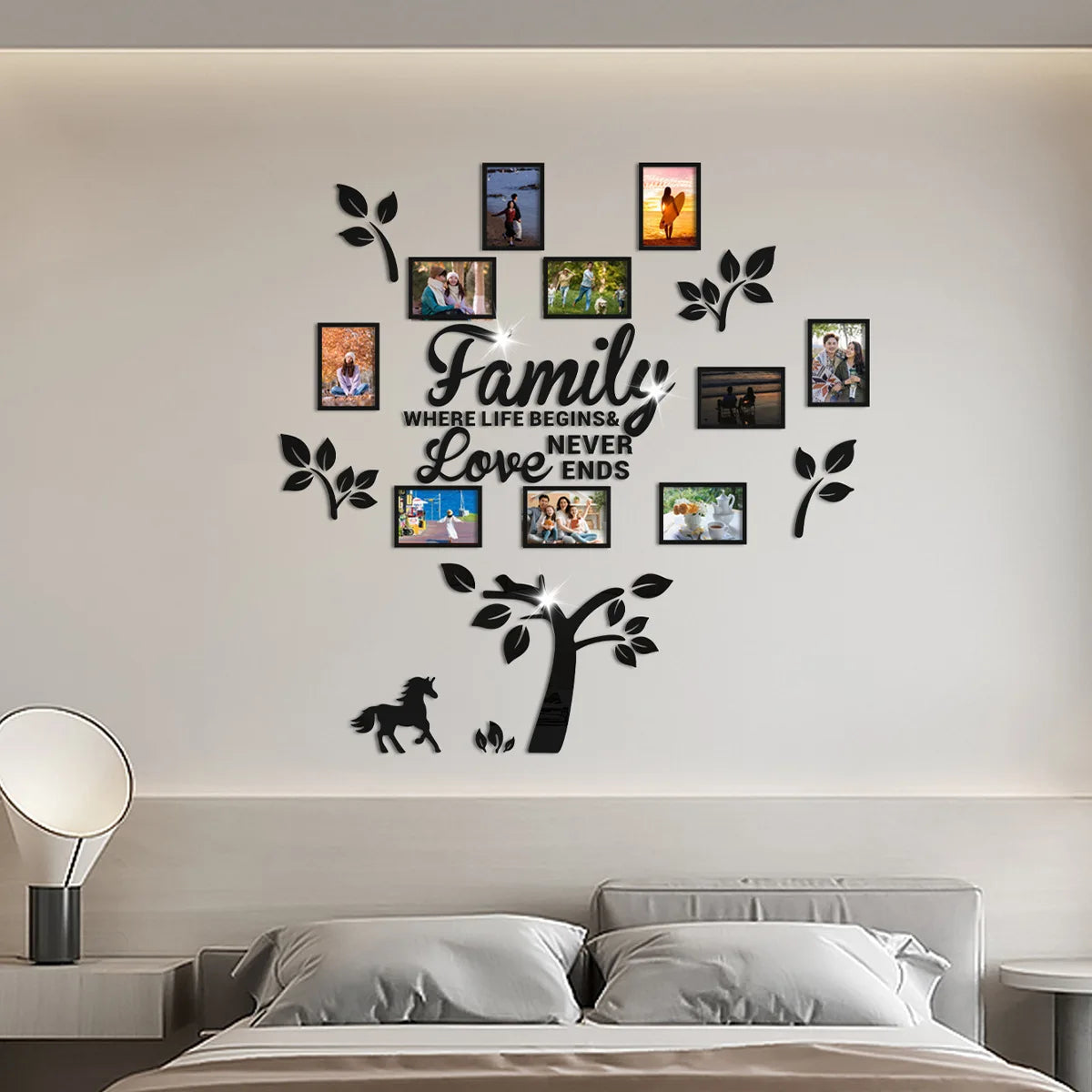 A wall decoration featuring a family tree design with various photo collages and leaves.