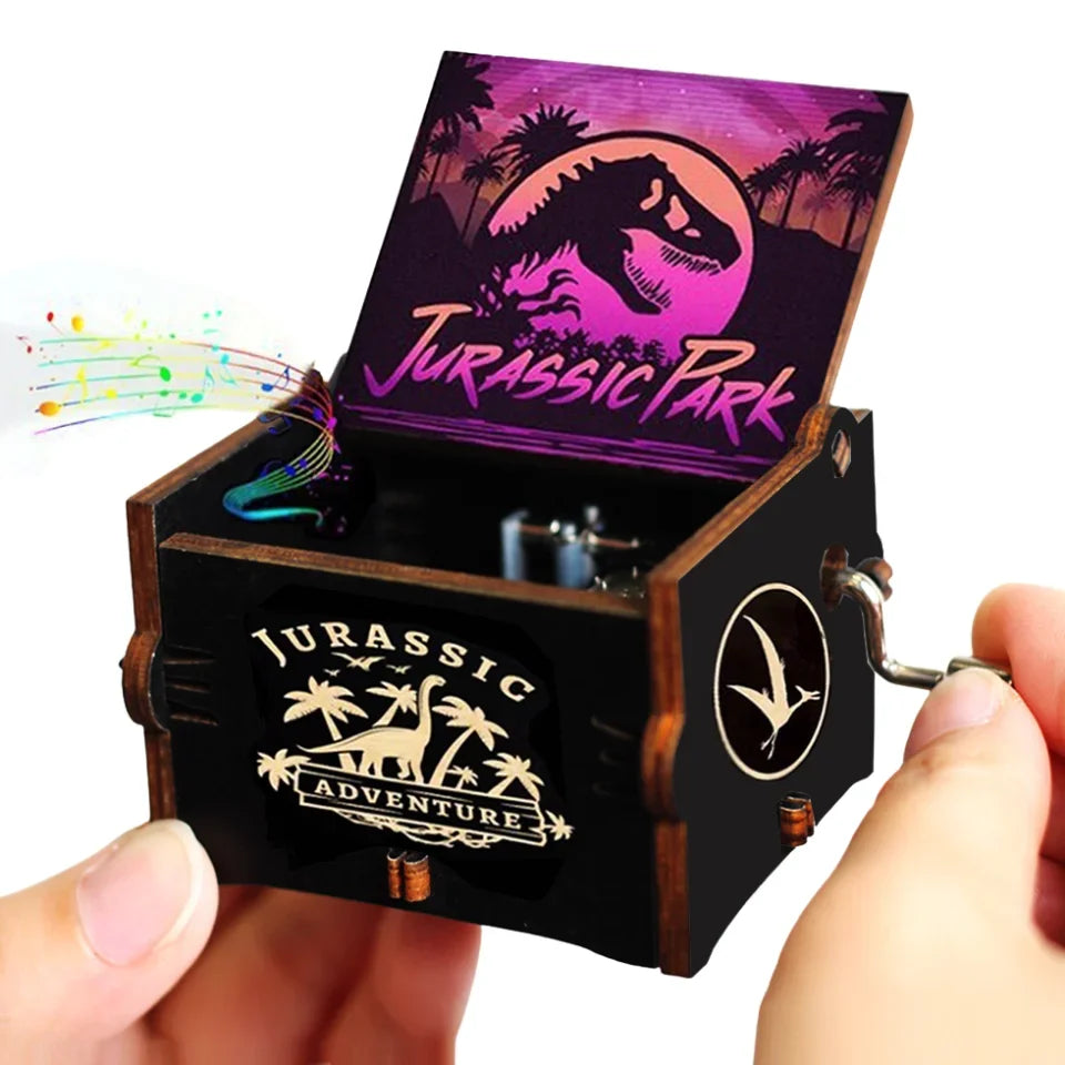 A carved wooden music box featuring a Jurassic Park theme with a dark purple and green design.