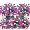 A vibrant display of colorful artificial flowers featuring purple, pink, and white blooms.