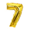 A shiny gold foil number balloon shaped like the numeral 7.