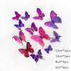 A collection of colorful 3D butterfly wall stickers in various sizes and shades