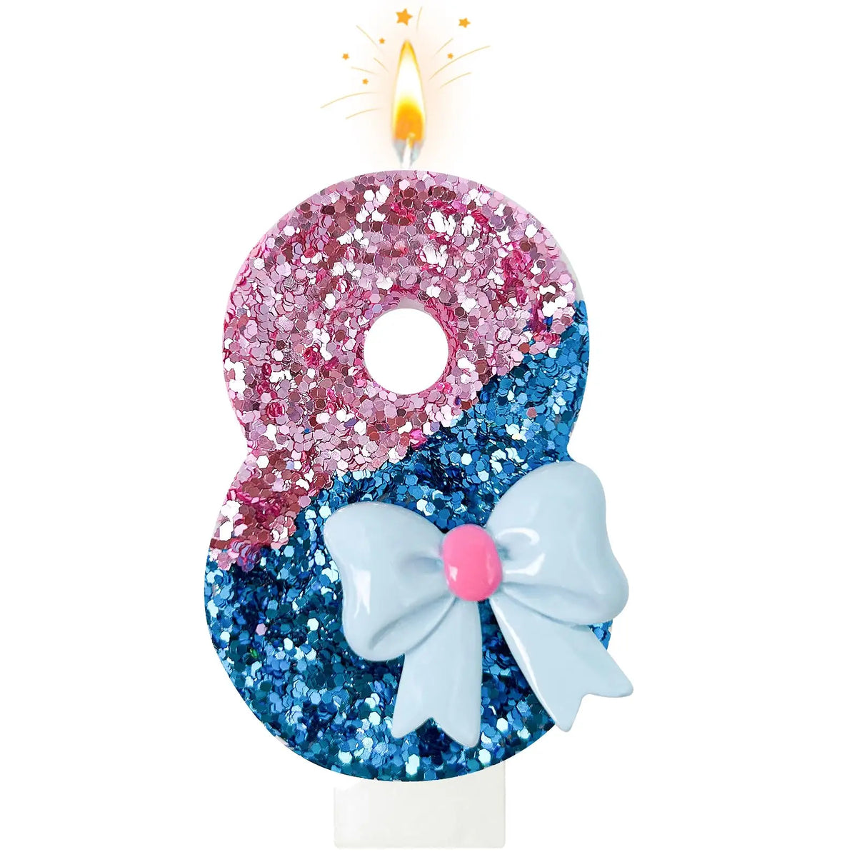 A round candle shaped like the number 8, decorated with glitter in shades of pink and blue, topped with a lit flame.