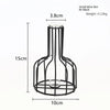 Black iron hollow vase with a cylindrical glass top and a circular base for flower arrangements