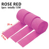 Ein Set aus drei rosa-roten Crêpepapier-Streamern, je 25 Meter lang, gerollt und ausgebreitet.