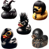 A set of seven black rubber duck figurines featuring various designs and textures.