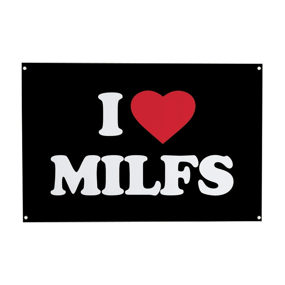 A black rectangular sign with white text that reads I ❤️ MILFS