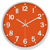 An orange round wall clock face showing the time, with white numbers and hands.