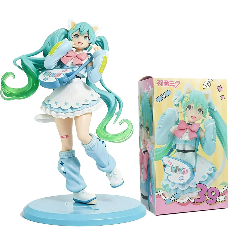 A PVC collectible figurine of Hatsune Miku in a light blue outfit and green hair, displayed on a circular base.