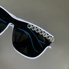 Black sunglasses with blue light lines and 'MARRIED' text on the frame