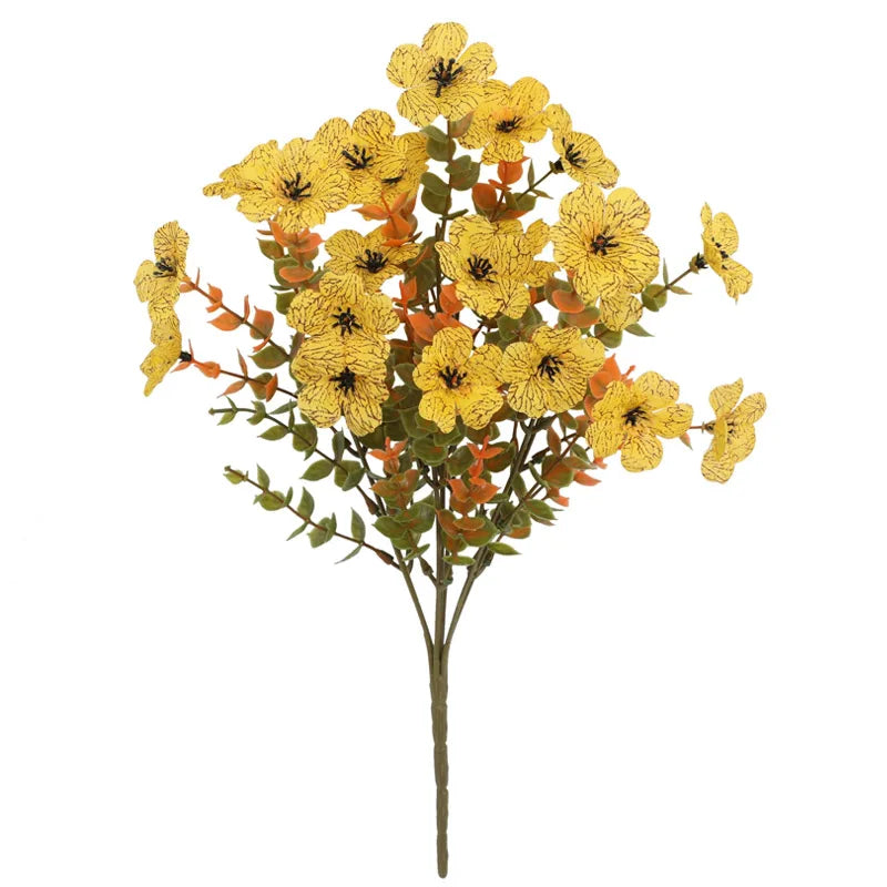A bouquet of vibrant artificial pansy flowers with yellow and orange petals on green stems.
