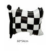 A black and white checkered inflatable pillow shaped like a racing car for a party decoration set.