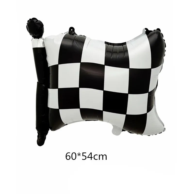 A black and white checkered inflatable pillow shaped like a racing car for a party decoration set.