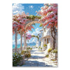 A vibrant painting of a Mediterranean street lined with flowering trees and white architecture under a blue sky.