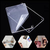 A clear acrylic magnetic photo frame with a transparent cover and mounting points.