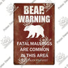 Vintage metal sign with a bear warning featuring text that fatal maulings are common in this area