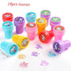 A collection of 10 colorful unicorn stamps in various colors and designs for birthday party supplies.