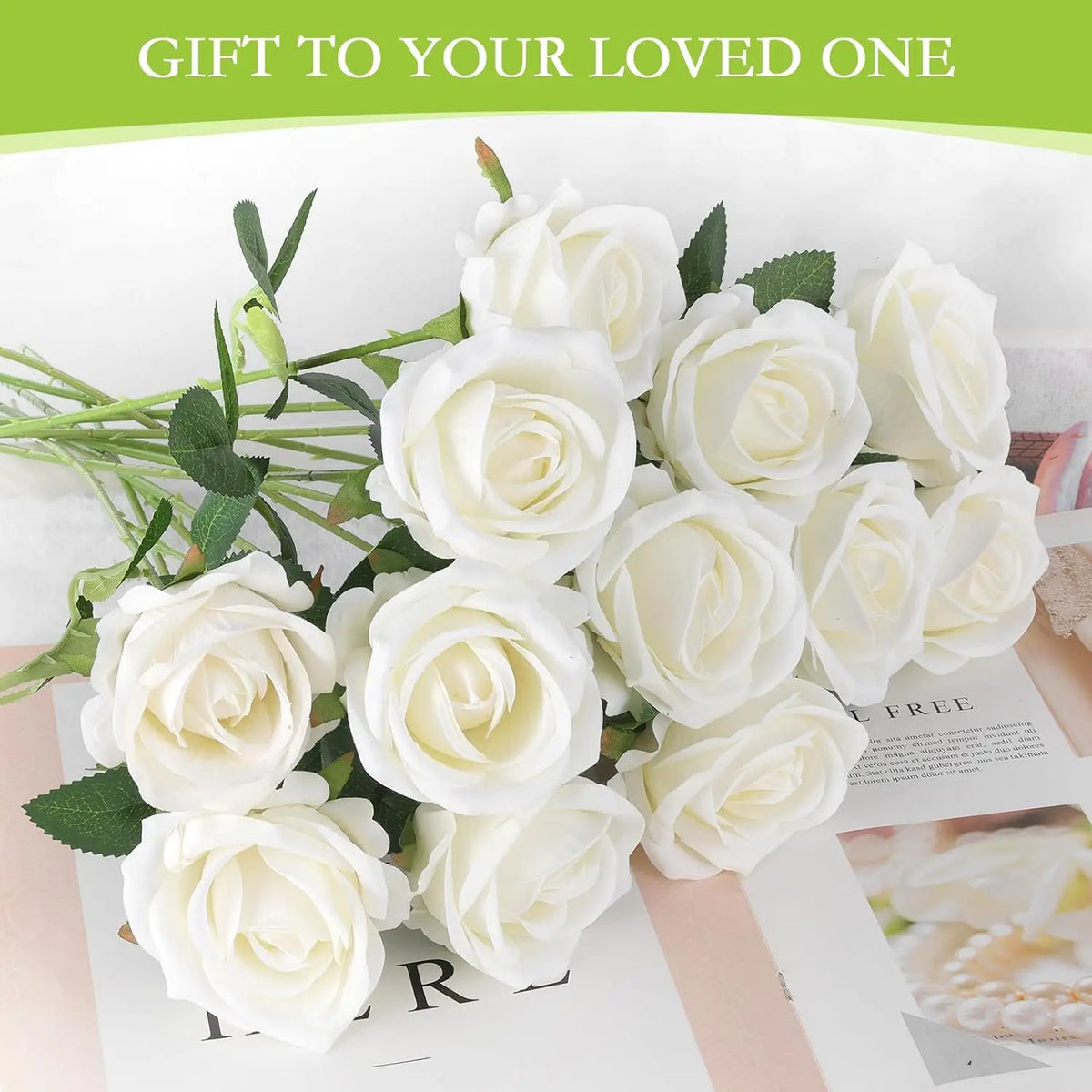 A bouquet of white artificial silk roses arranged for table decor.