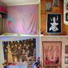 A collection of bohemian mandala tapestry wall hangings and decorative items displayed on a wooden shelf.