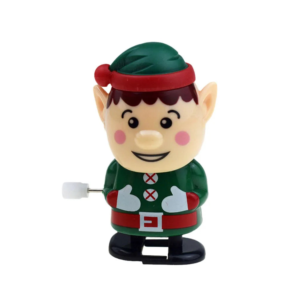 A green and red clockwork wind-up figurine of a man wearing a hat and jacket with white accents.