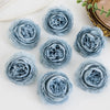 A collection of light blue silk peony artificial flowers arranged on a white surface.