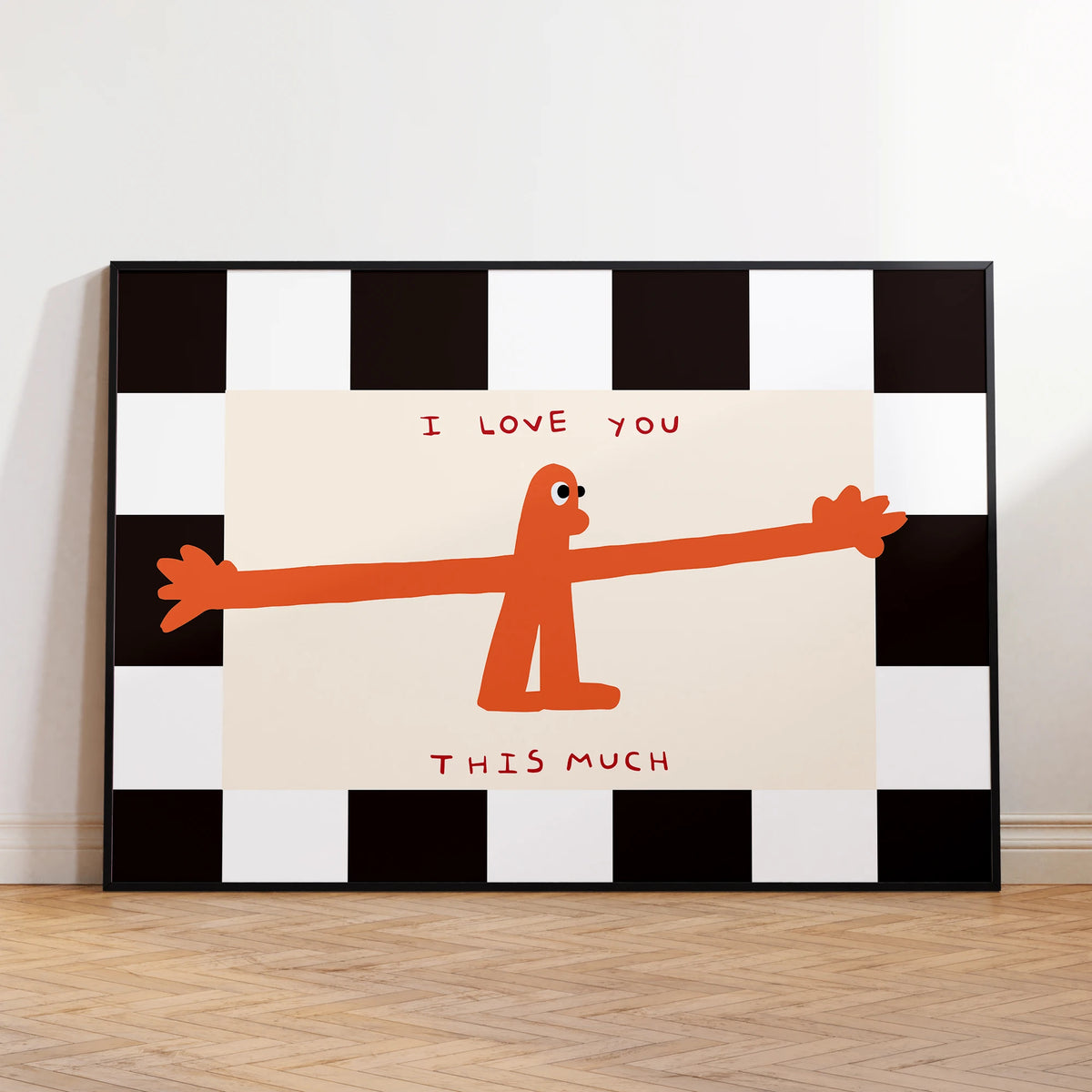A black and white checkered wall art print featuring an orange silhouette of a figure with the text I love you this much