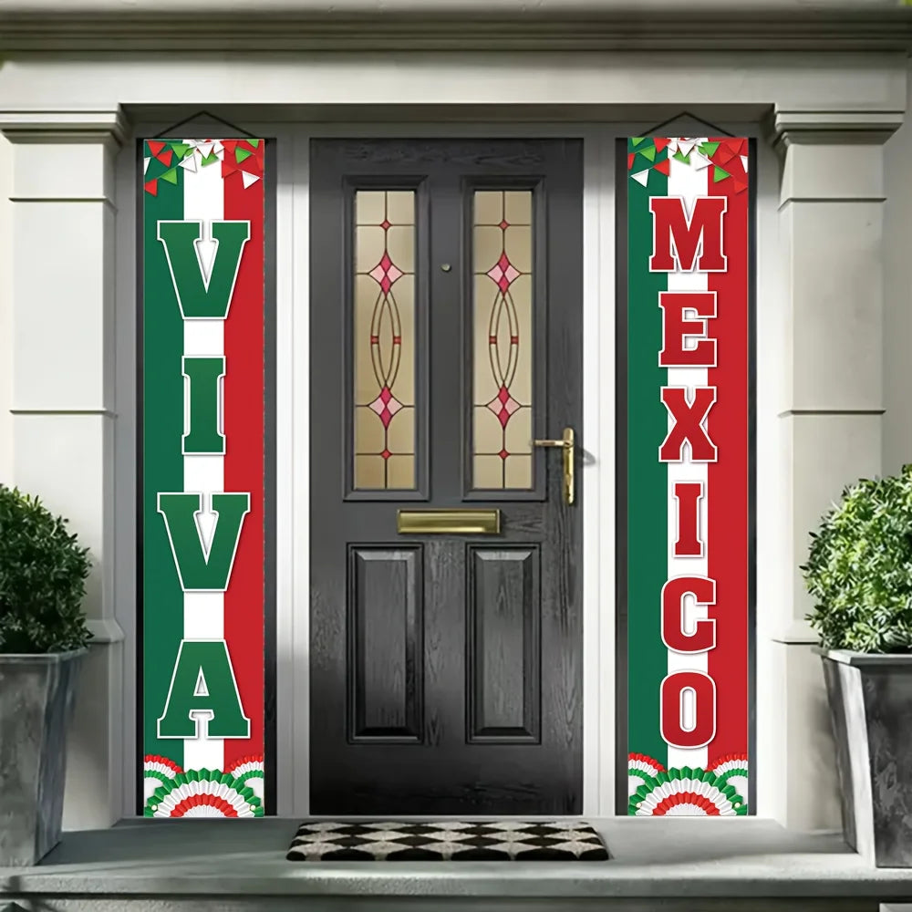 A dark door with decorative glass panels flanked by vertical banners featuring the words Viva Mexico