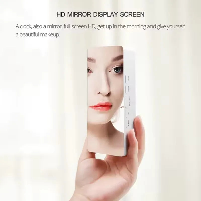 A hand holds an HD mirror display screen showing a woman's face.