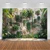A vertical wall backdrop featuring lush green tropical plants and palm leaves for party decor or photography.