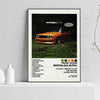 A framed photograph of an orange car in a grassy field with the text nostalgia ultra and Frank Ocean nostalgia ultra