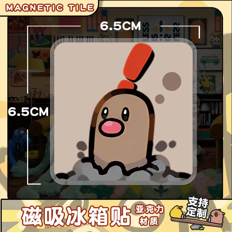 A cute, round brown and orange character figure made of magnetic tile is shown against a light background.