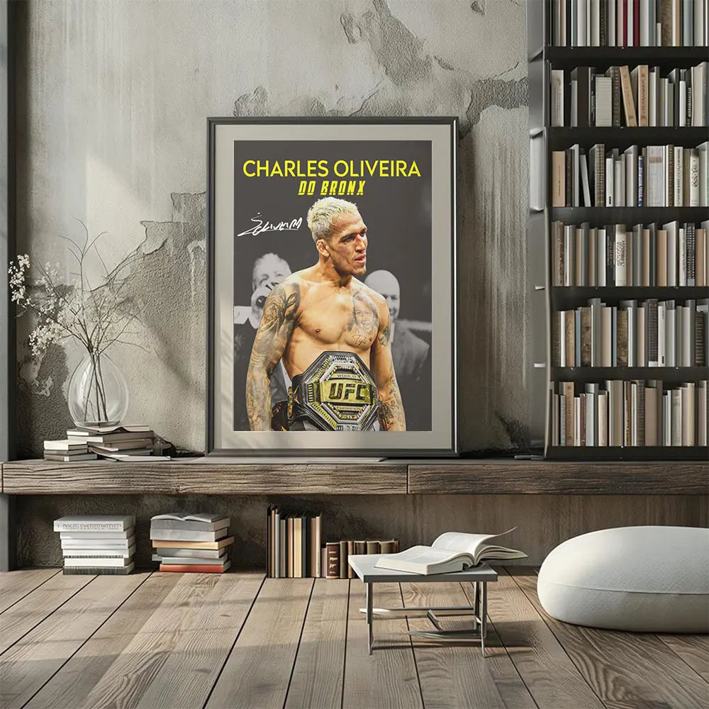 A framed poster of Charles Oliveira in a UFC fight pose displayed on a wooden shelf.