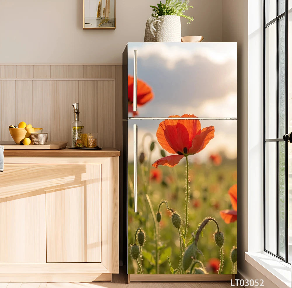 A modern refrigerator featuring a floral design decal of an orange-red tulip against a blurred outdoor background.
