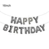 A string of black and white checkered foil letter balloons spelling out HAPPY BIRTHDAY