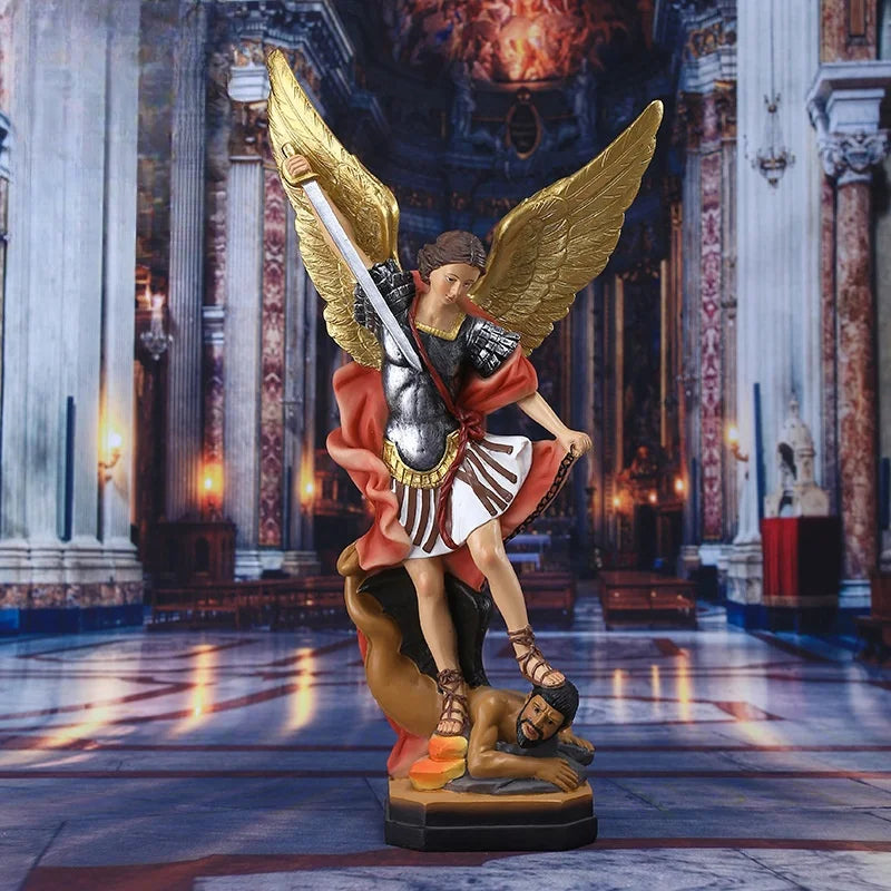 Bronzed Saint Michael Archangel resin figurine with golden wings and a sword standing on a pedestal.
