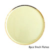 Eight 9-inch gold disposable plates shown from above