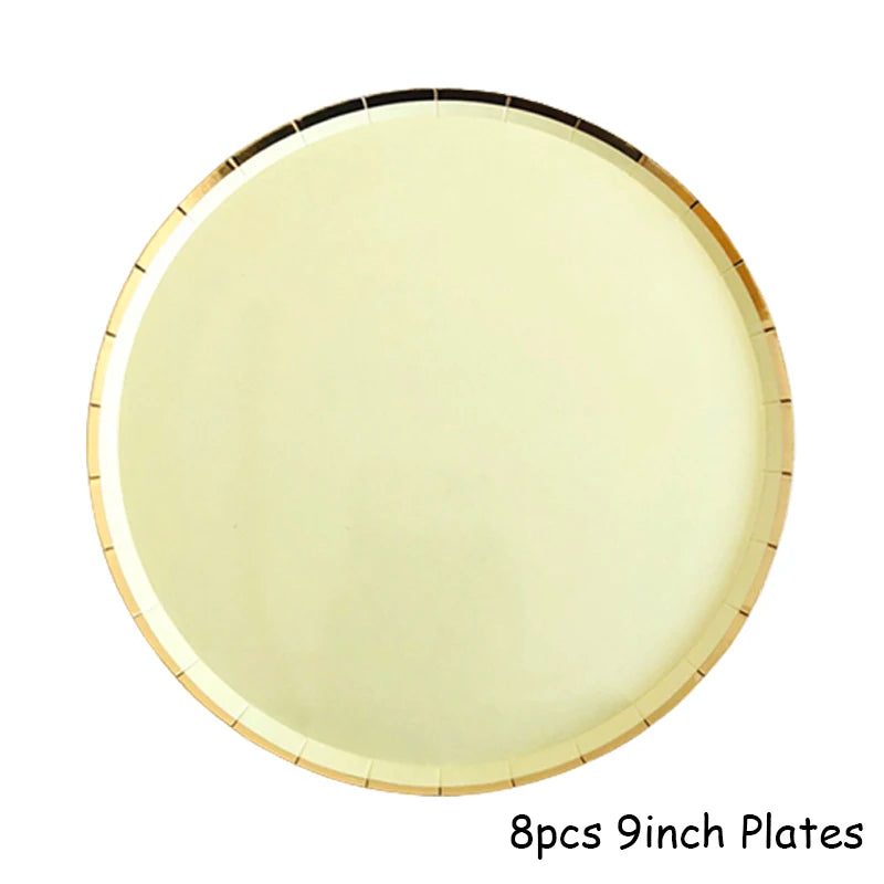 Eight 9-inch gold disposable plates shown from above
