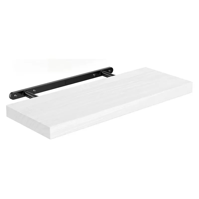 Étagère flottante en bois blanc avec support noir.