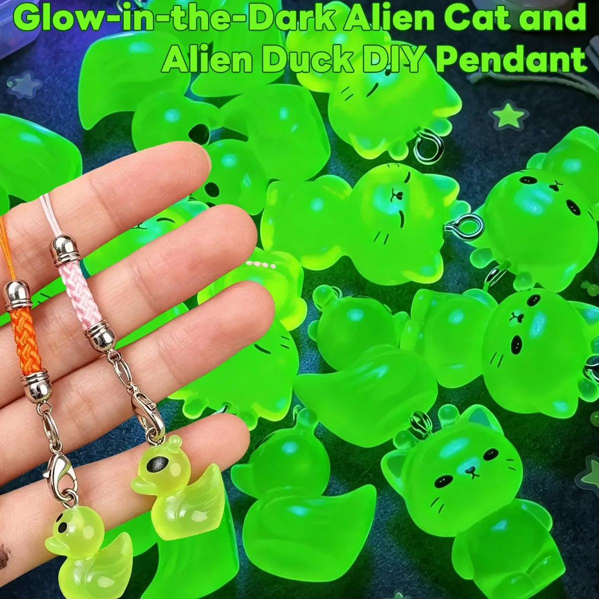 Hand holding glow-in-the-dark green resin alien cat and duck charms