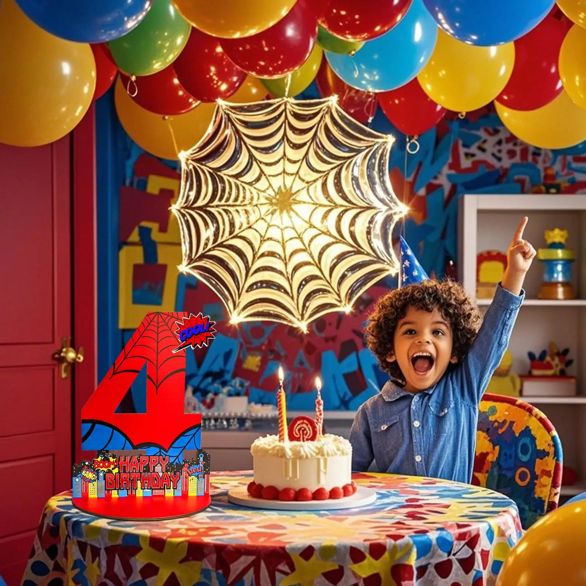 A child celebrates with a wooden spider-themed birthday number sign centerpiece decorated with balloons and streamers.