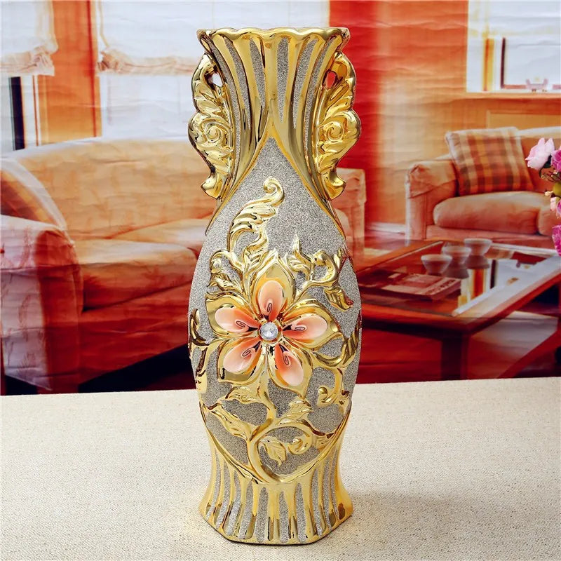 Gold-plated ceramic tabletop vase with ornate floral design and gold accents