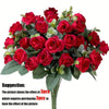 A bouquet of deep red silk roses and green eucalyptus leaves for wedding or home decor.