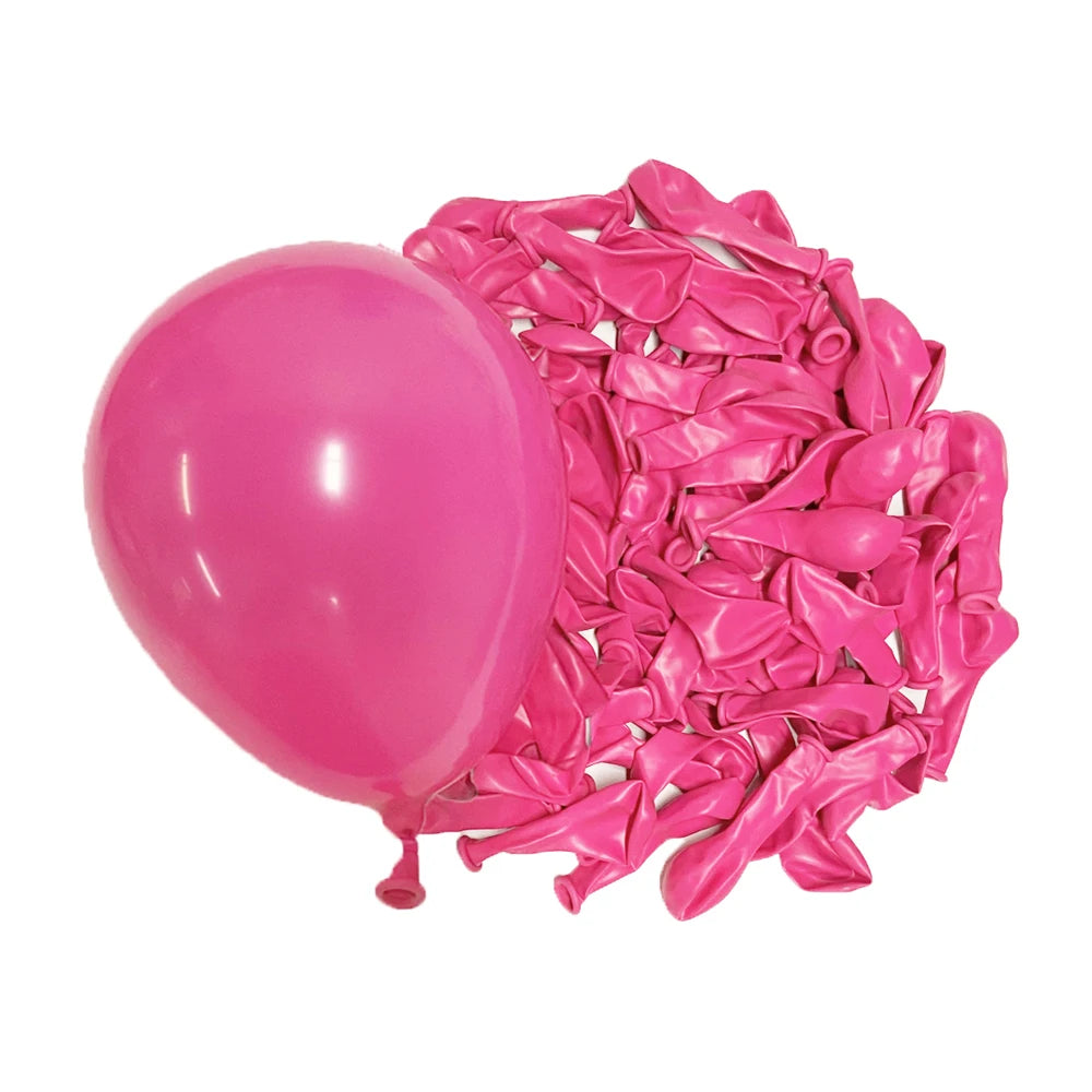 A cluster of vibrant pink latex balloons is shown next to a single large pink balloon.