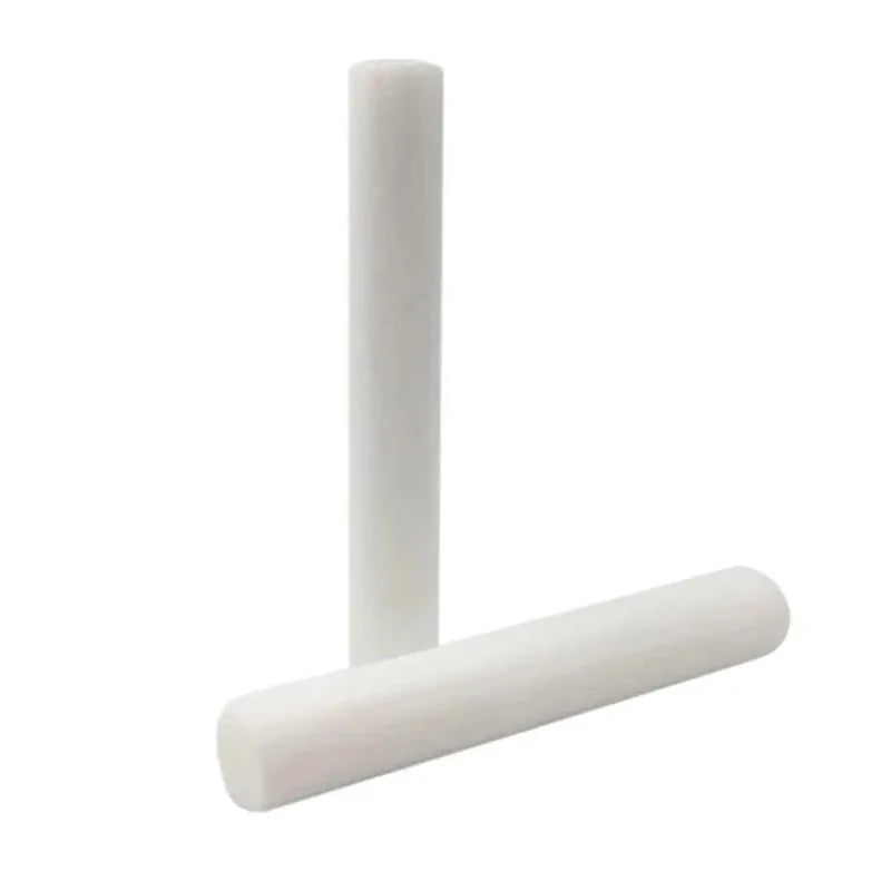 A white foam flower arrangement cylinder used for wedding centerpieces.