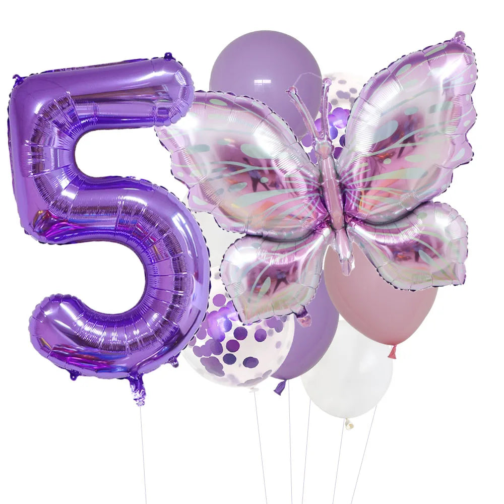 A set of purple foil balloons shaped like the number 5 and a butterfly