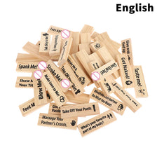 A pile of wooden building blocks with various phrases and symbols for dating and party building